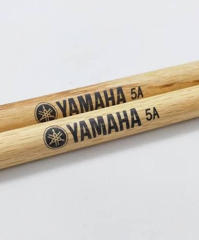 ProMark drum sticks arranged for a retail product card.